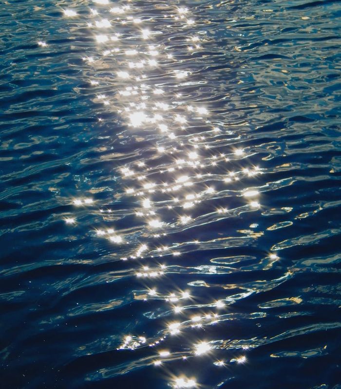 Abstract blue ocean waves representing male vitality and calmness